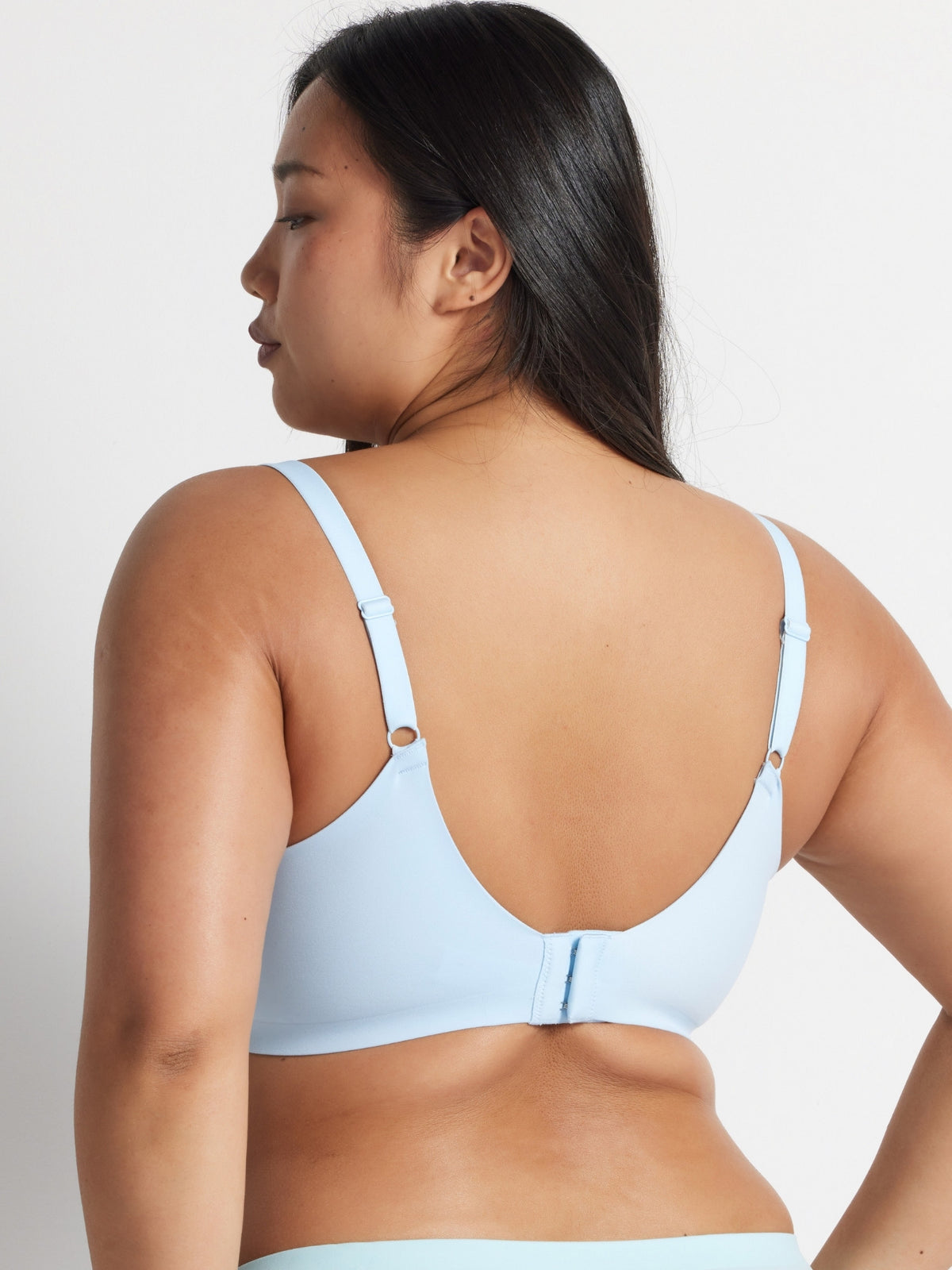 Blue Alive T-Shirt Bra worn from behind, showing the adjustable straps and gel elastic wings.