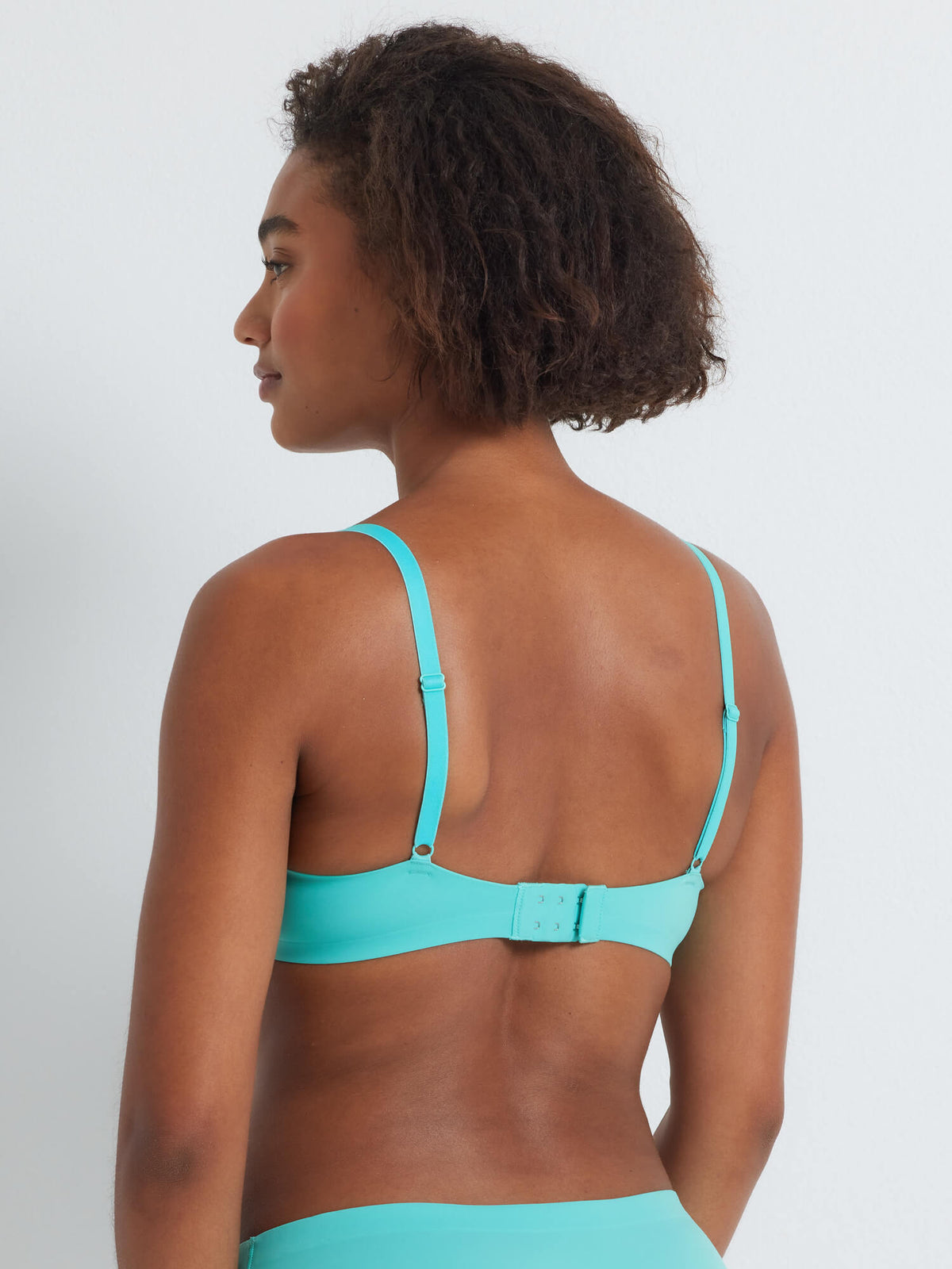 Mae wears a 12B in the Alive Graduated Push Up Bra in Aqua Blue by Kayser Lingerie