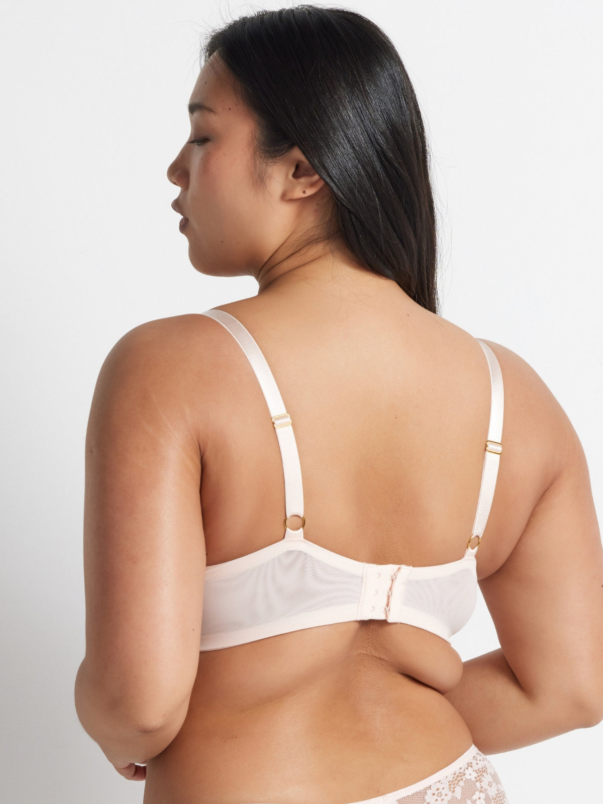 Shell Be Free Lace Balconette Bra worn from behind, showing the adjustable straps and hook and eye closure.