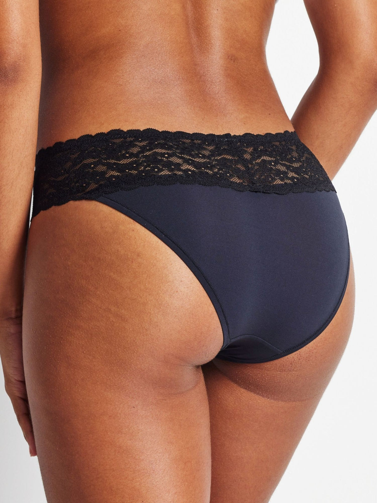 Close-up back view of Glowlights Bikini Brief in Black highlighting design and coverage.