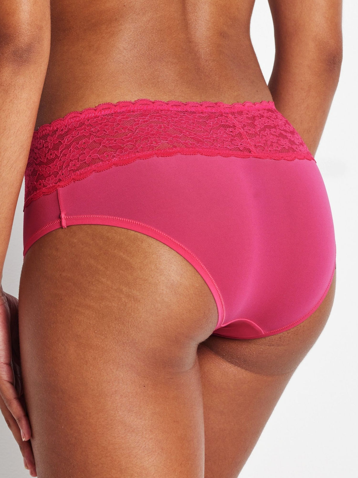 Close-up back view of pink Glowlights Hi-Rise Brief lace waistband and design.