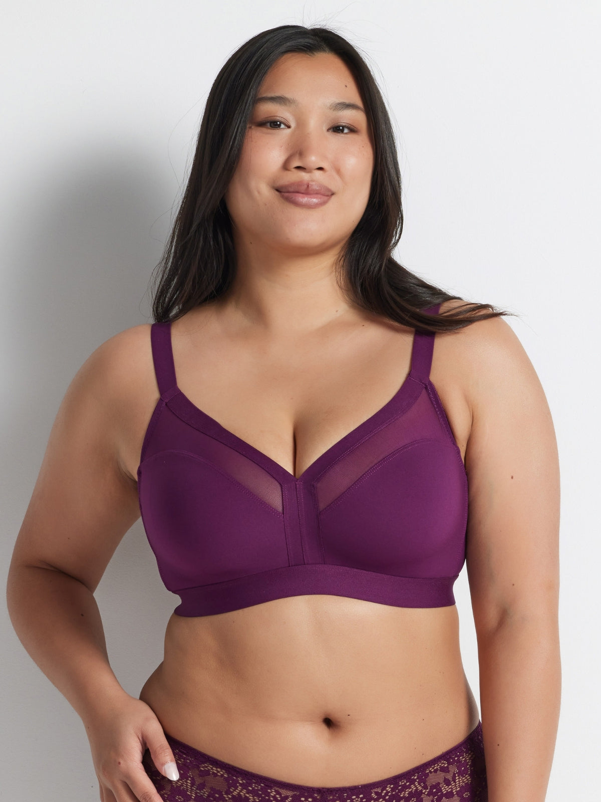 Chloe is wearing the Hold Up Unreal Wire Free Bra in pickled beet by Kayser Lingerie