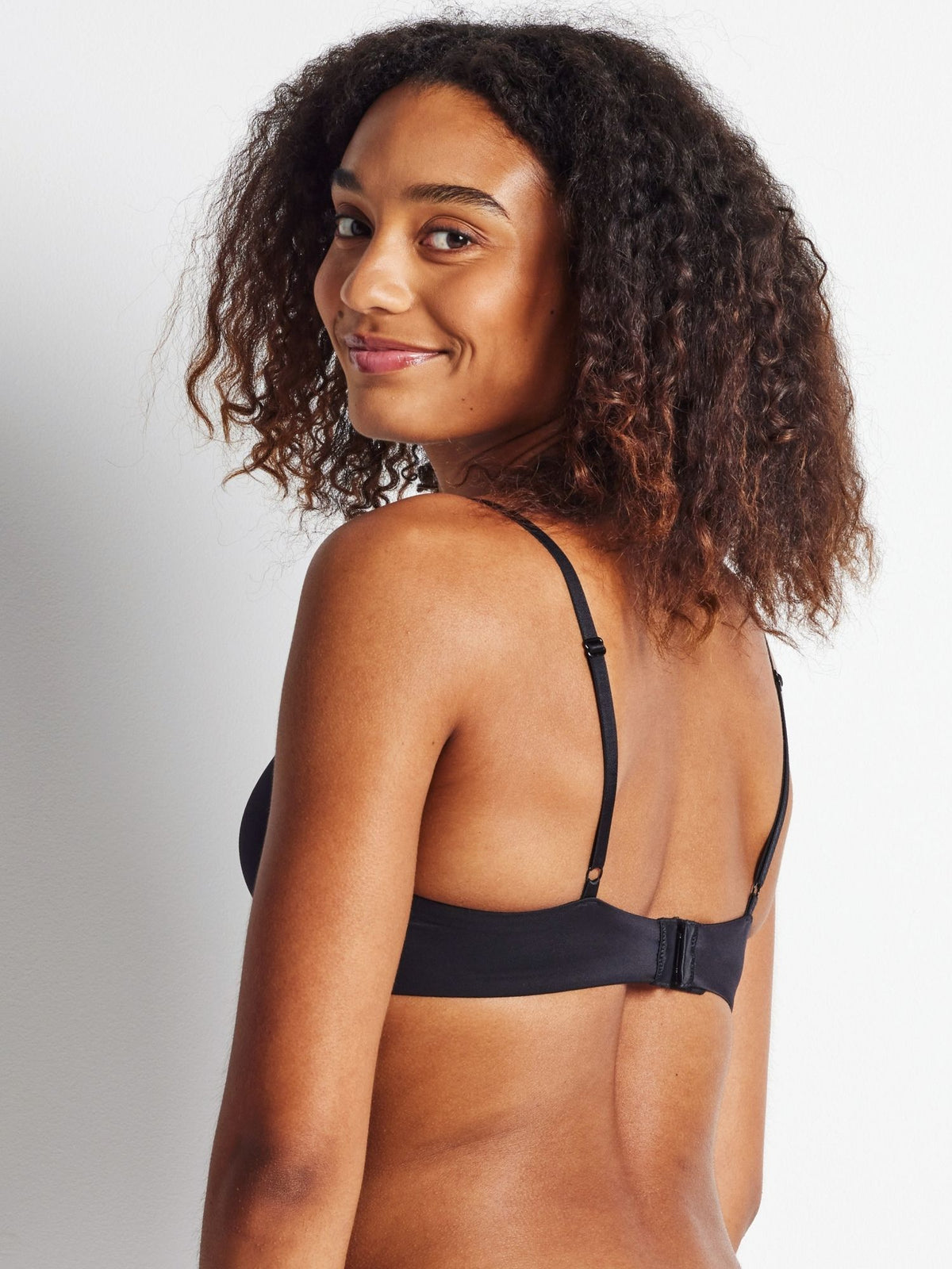 Black push-up bra with soft micro wings and padded closure