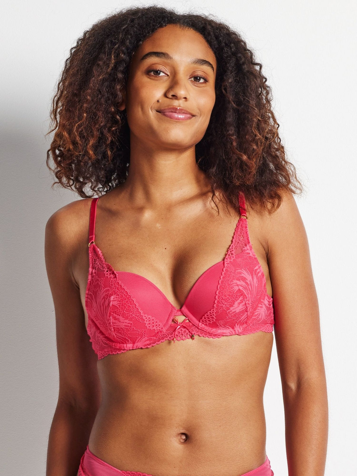 Mae wears the Kayser After Dark Cosmic Nights Push-Up Bra in Raspberry Pink