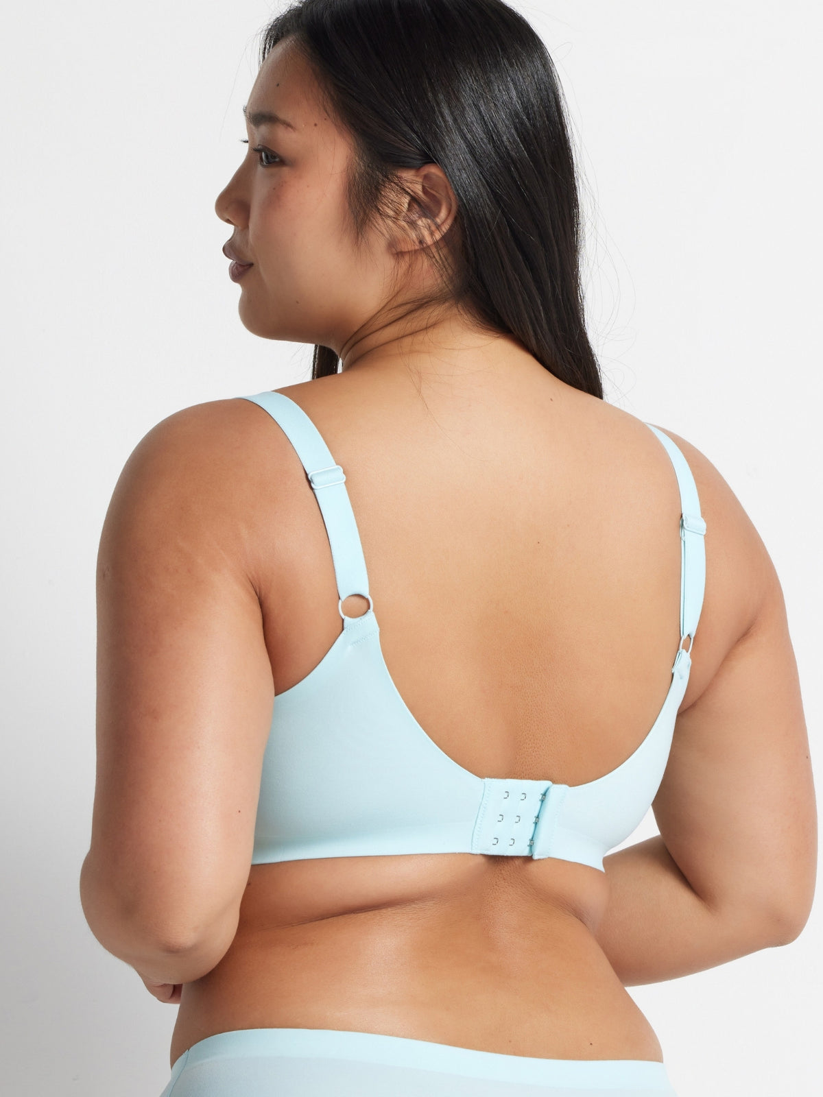 Back view of the aqua blue wire free bandeau bra showing the adjustable straps.
