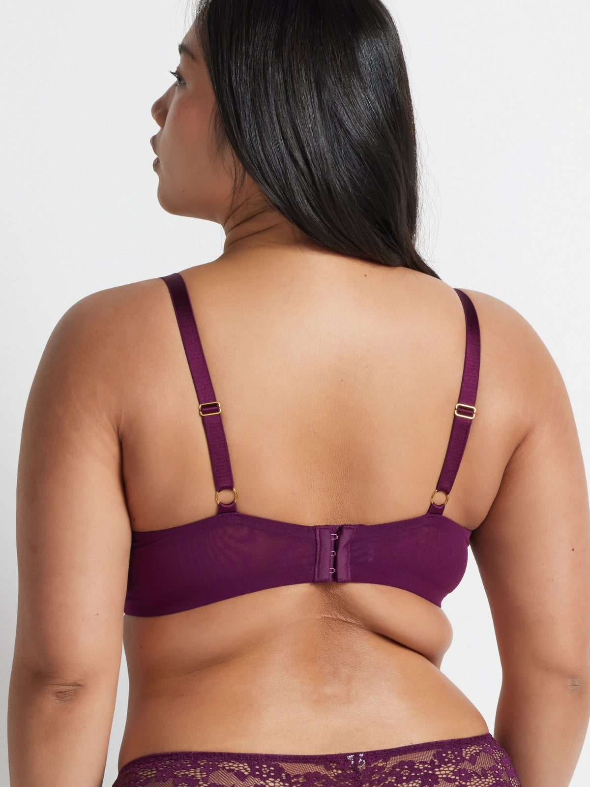 Back view of the burgundy lace balconette bra showing the adjustable straps and hook and eye closure.