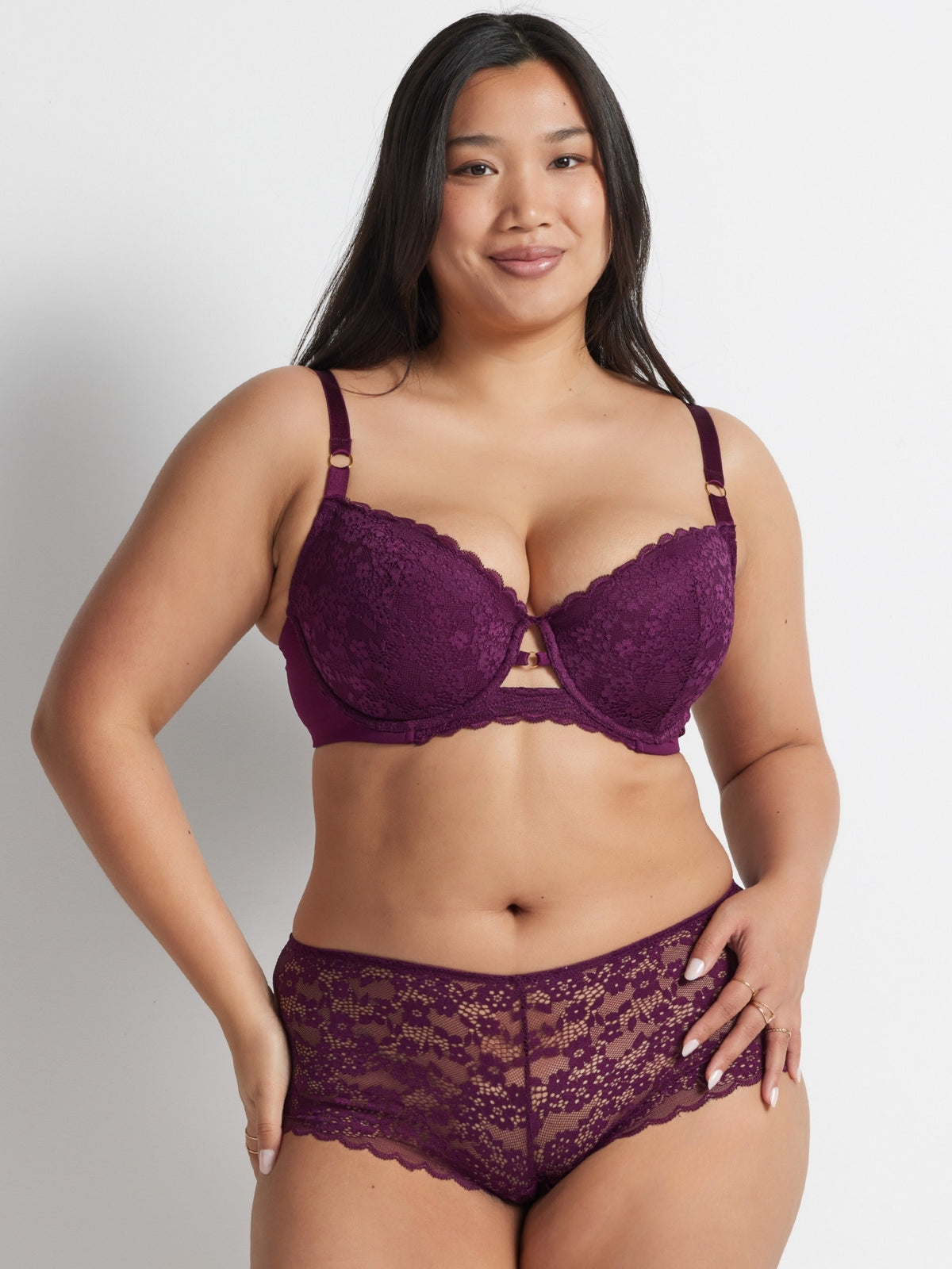 Chloe wearing the Be Free Lace Short in burgundy with matching bra by Kayser Lingerie