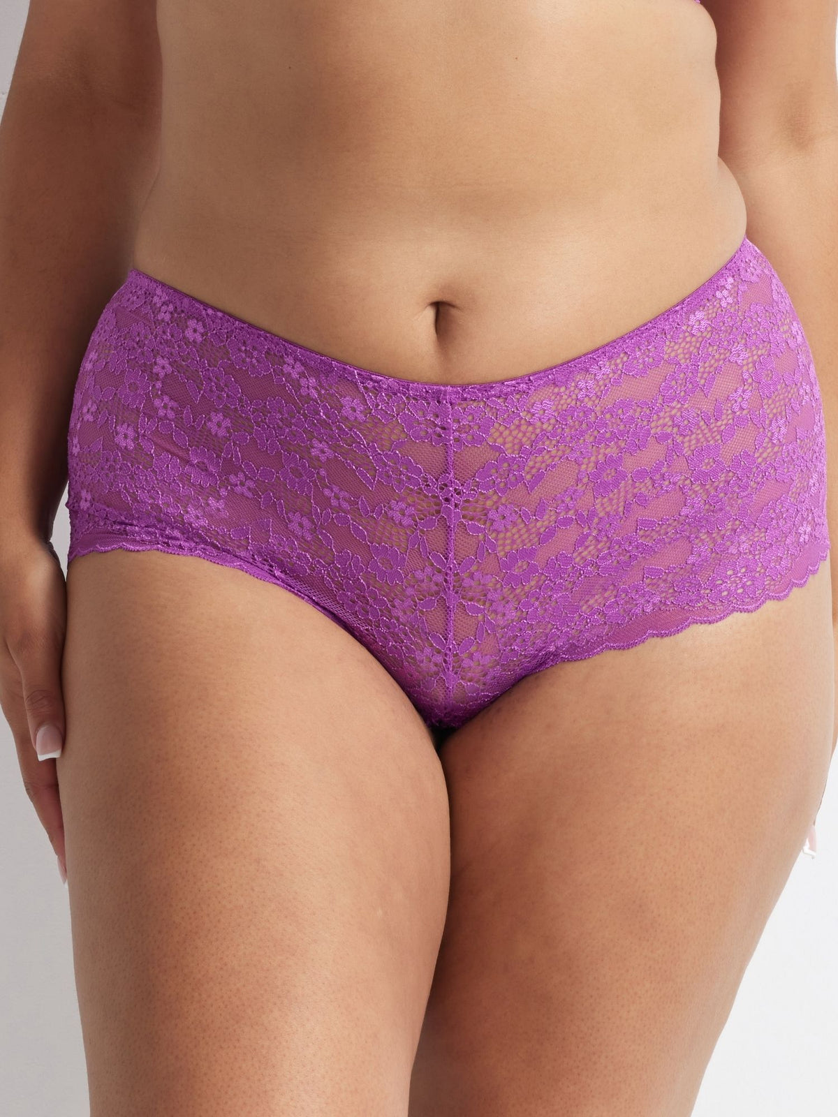 Close-up detail of the Be Free Lace Short lace pattern and soft waistband.