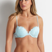 Frankie is wearing the Brazilian Push Up Bra in aqua blue with matching briefs by Kayser Lingerie