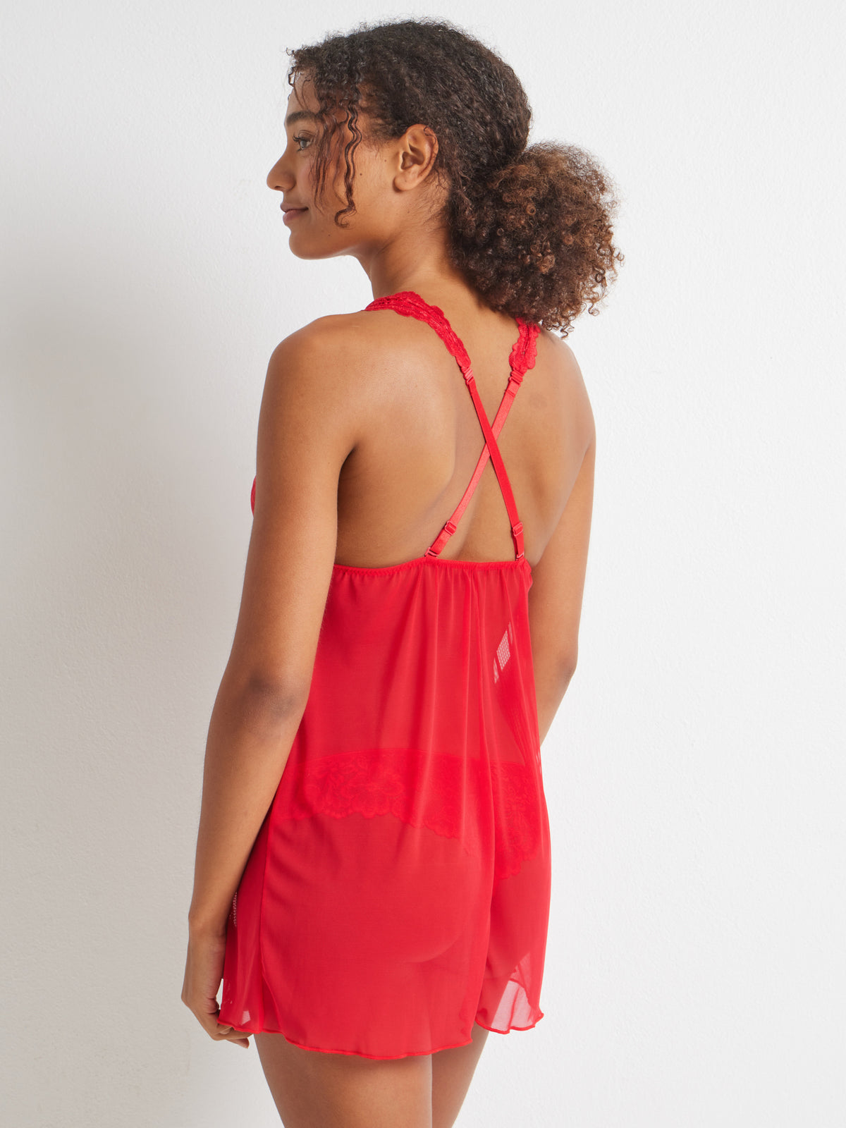 Kayser Brazilian Babydoll Chemise in Red, sheer mesh skirt and lace bra top, criss-cross strap detail, side profile