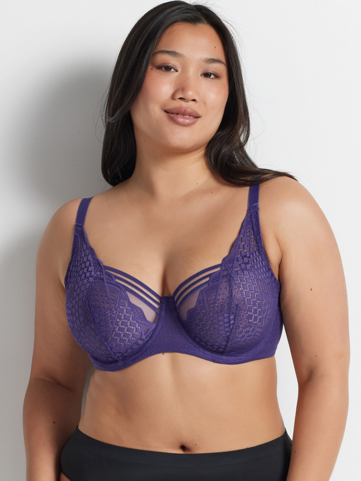 Chloe is wearing the Hold Up Epic Lace Underwire Bra in Mulberry by Kayser Lingerie
