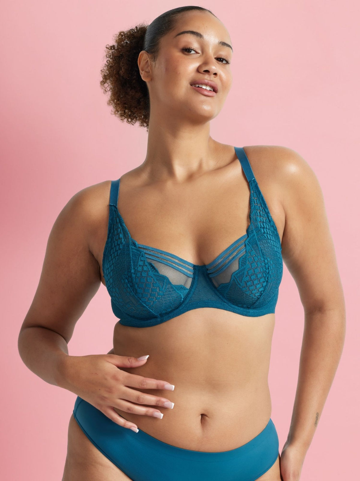 Front view of the Kayser Hold Up Epic Lace Underwire Bra in Blue Coral featuring intricate lace cups and supportive underwire.