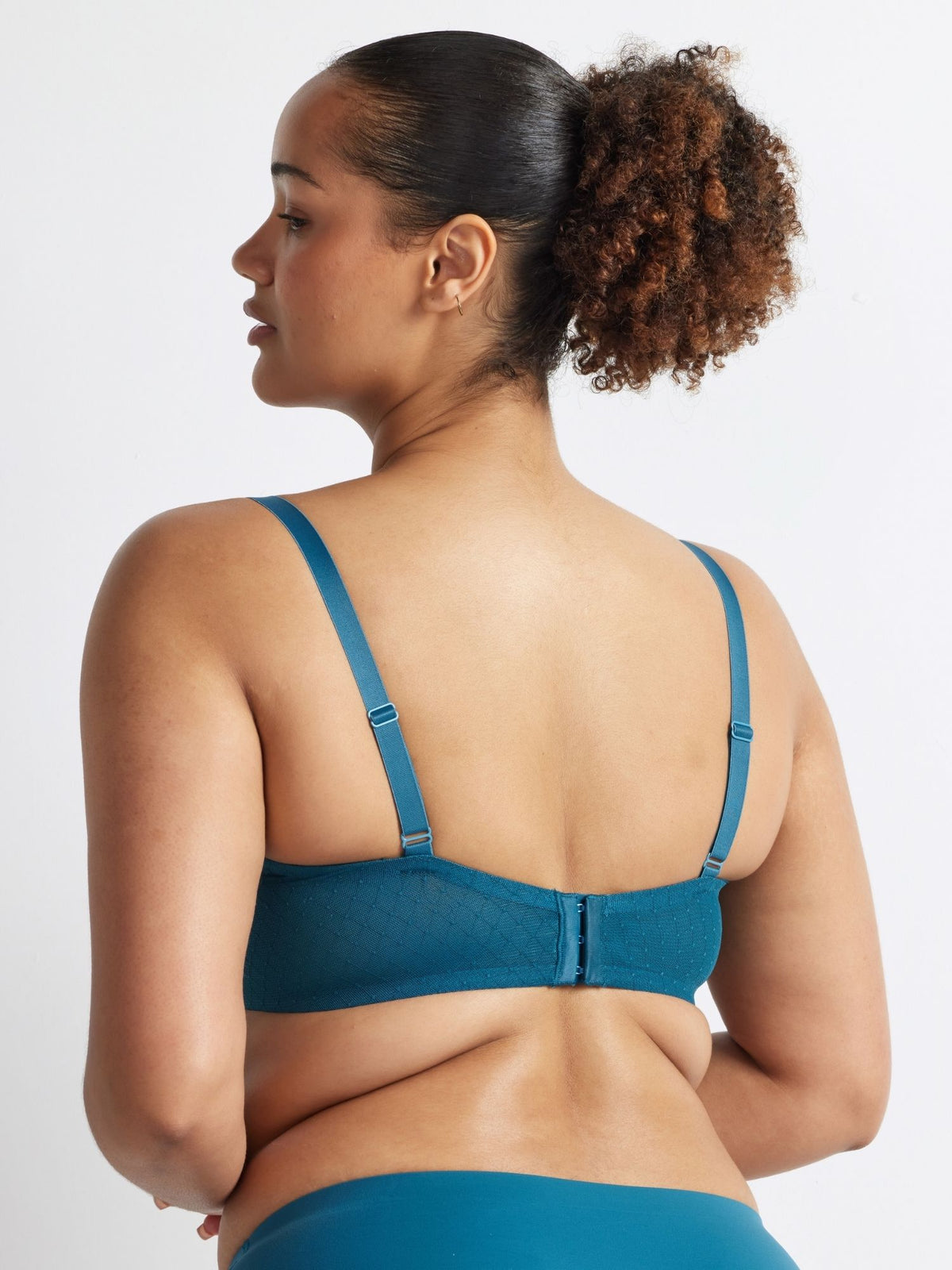 Back view of the Kayser Hold Up Epic Lace Underwire Bra in Blue Coral showing adjustable straps and a hook-and-eye closure.