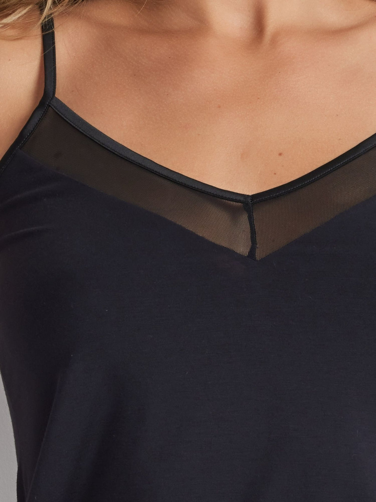 Close-up detail of the Kayser Mesh Insert Cami in black mesh panels and soft fabric finish.