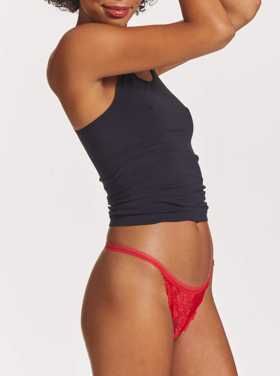 Side of Brazilian String Gee in Red with black singlet